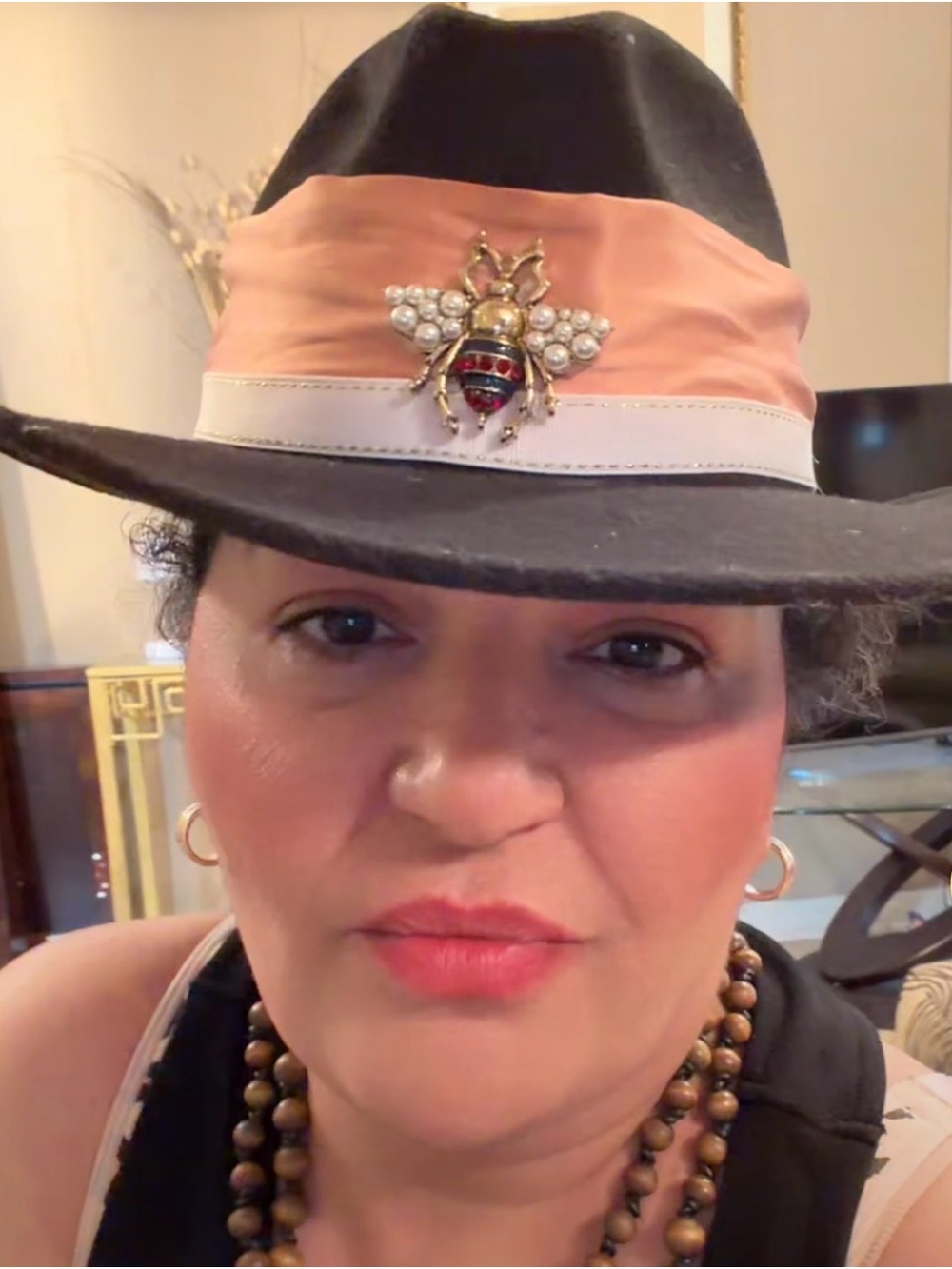 Wide-Brim Black Fedora with Peach Band and Bee Brooch